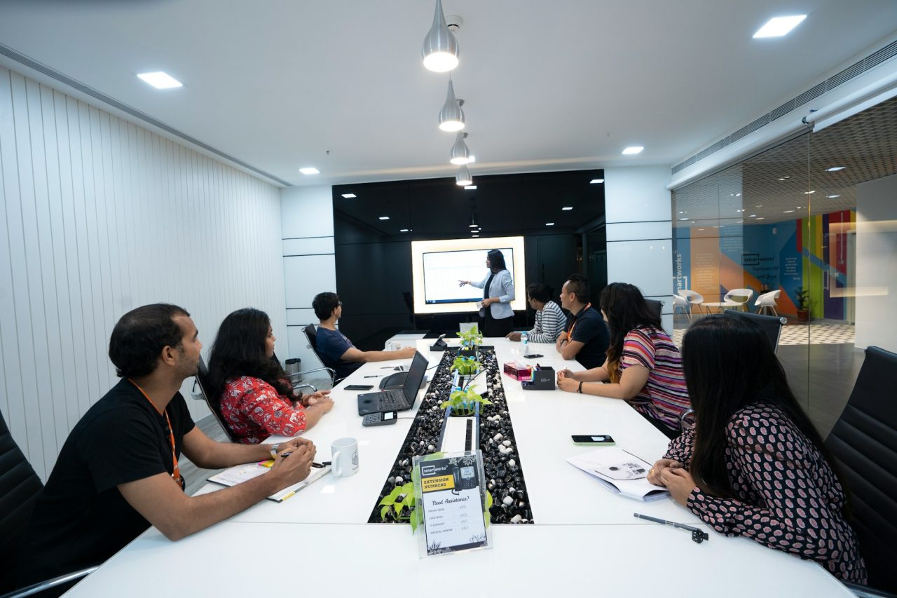 Compliance team in a client presentation at an Indian office